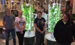 Greensburg FFA members with tower gardens
