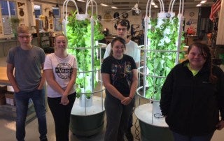 Greensburg FFA members with tower gardens