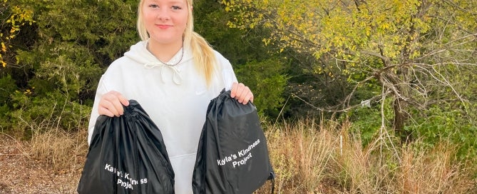 Kayla Leeper with her kindness bags.
