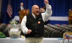 Man holding hand hi with excited expression