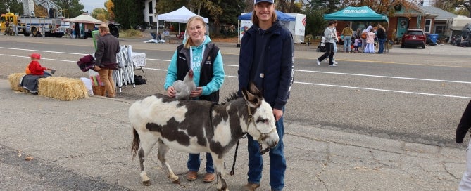 Sarah Jones and Dillan Lerwill with their animals at Treats on the Streets.