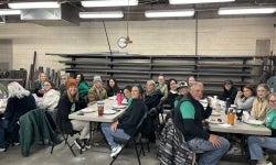 Texico Teachers gather to eat their appreciation breakfast before school.