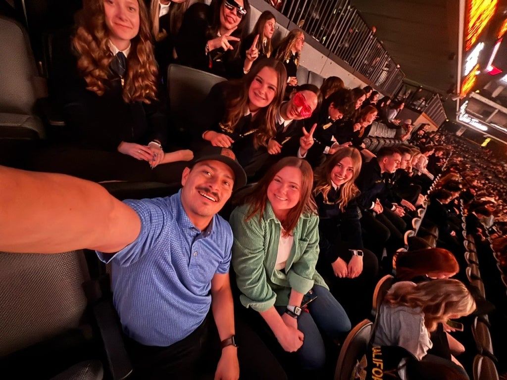 Mr. Andrade, a NJUHSD CTE Representative, Shannon and students take a .5 photo as they get hyped for the 97th California FFA State Leadership Conference.