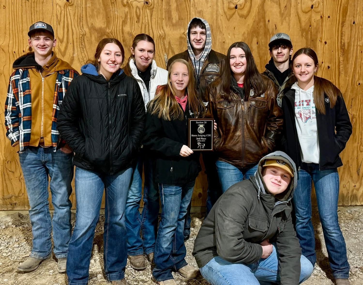 The Effingham FFA Chapter Horse Judging Team poses with its third-place plaque.