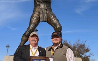 L to R Brandon and Jake Devine pose for a picture after receiving his honorary American degree.