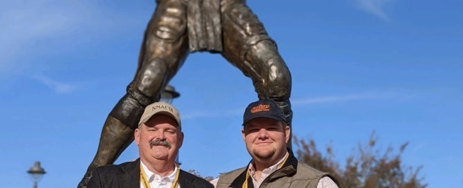 L to R Brandon and Jake Devine pose for a picture after receiving his honorary American degree.