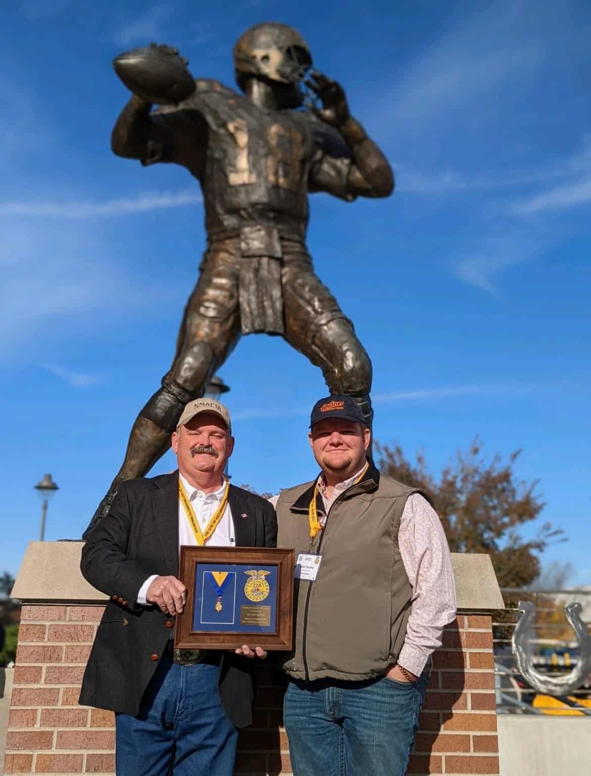 L to R Brandon and Jake Devine pose for a picture after receiving his honorary American degree.