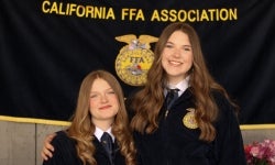 Reanna McLoughlin and Morgan Darrow pose for camera