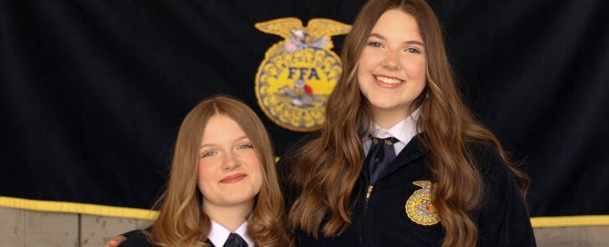 Reanna McLoughlin and Morgan Darrow pose for camera