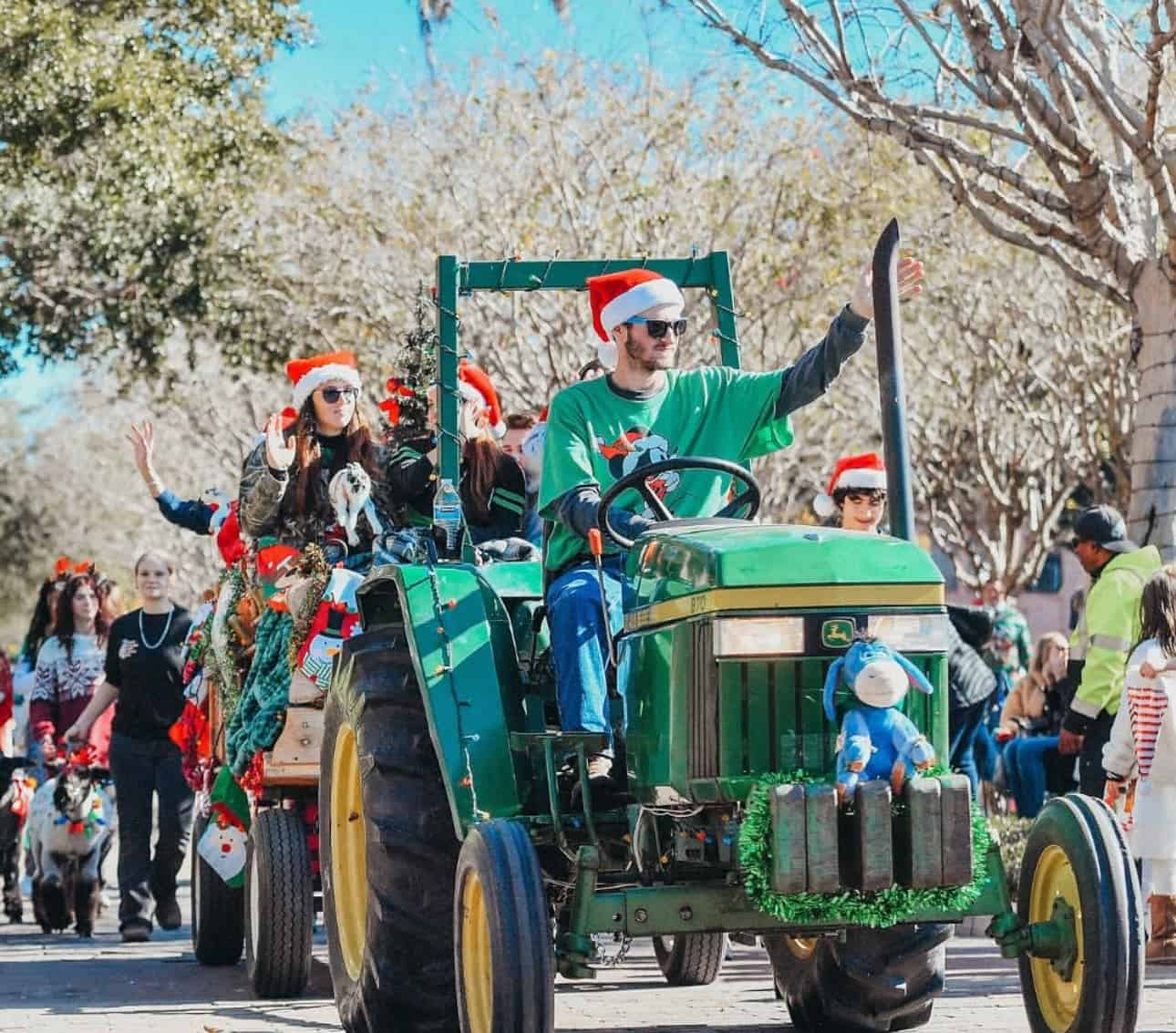 Spencer drives the West Orange FFA Chapter’s tractor during a winter parade.