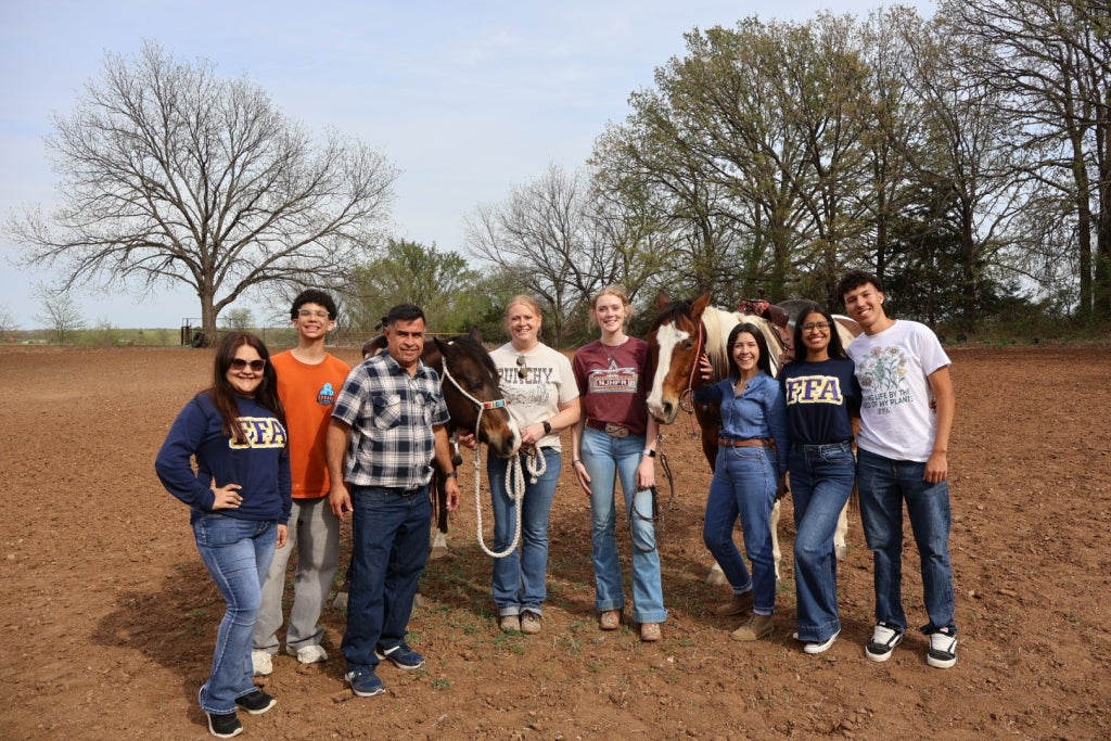 Puerto Rico FFA members learned about Latta FFA member Reagan Jones’ equine-focused Supervised Agricultural Experience (SAE) project during their time in Oklahoma. Photo courtesy of Seth Reeves.