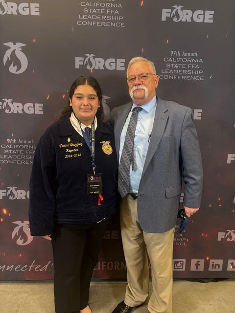 Viviana Velazquez interviewed retiring California FFA state advisor Charles Parker for a story she wrote as an FFA in the USA reporter. Photo courtesy of Viviana Velazquez. 