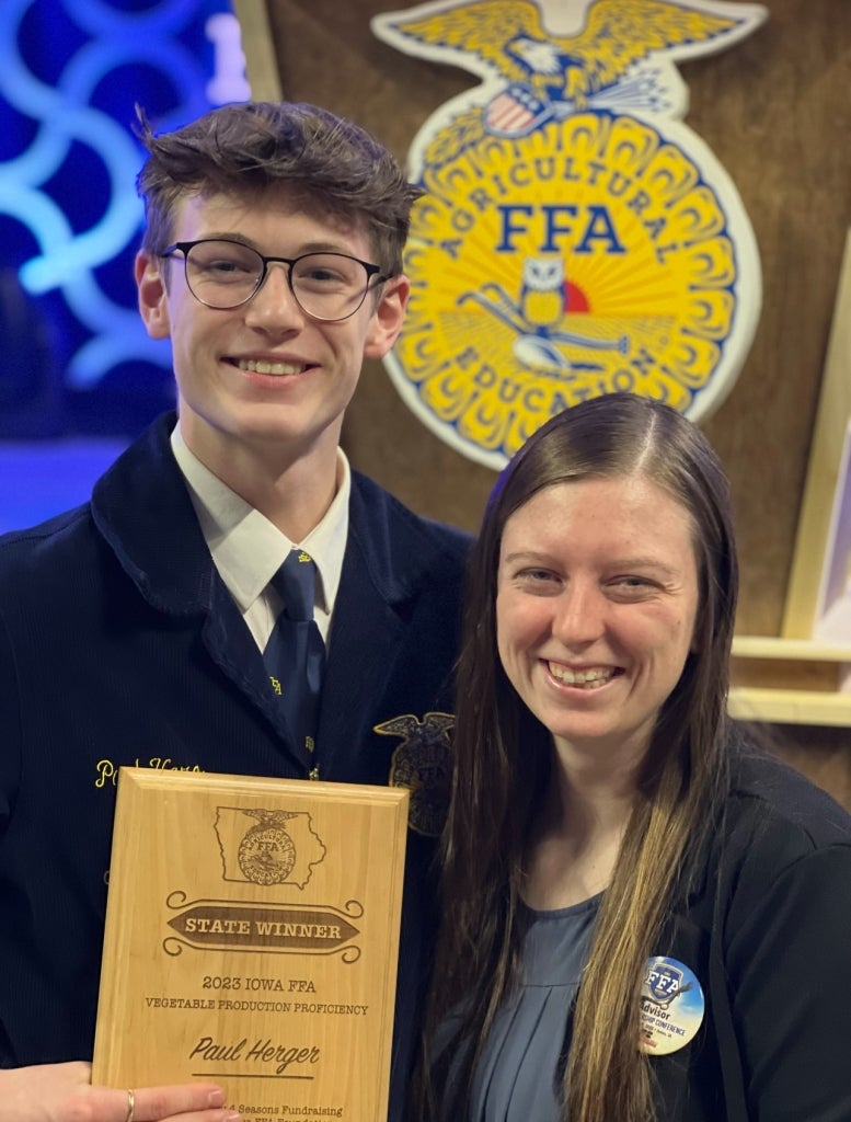 Herger smiles with his advisor, Gabby Power, after accepting his state proficiency award. Photo courtesy of Paul Herger.