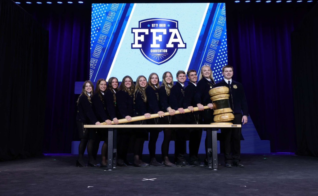 Boyer poses alongside her state officer team during the 97th Ohio FFA Convention & Expo.