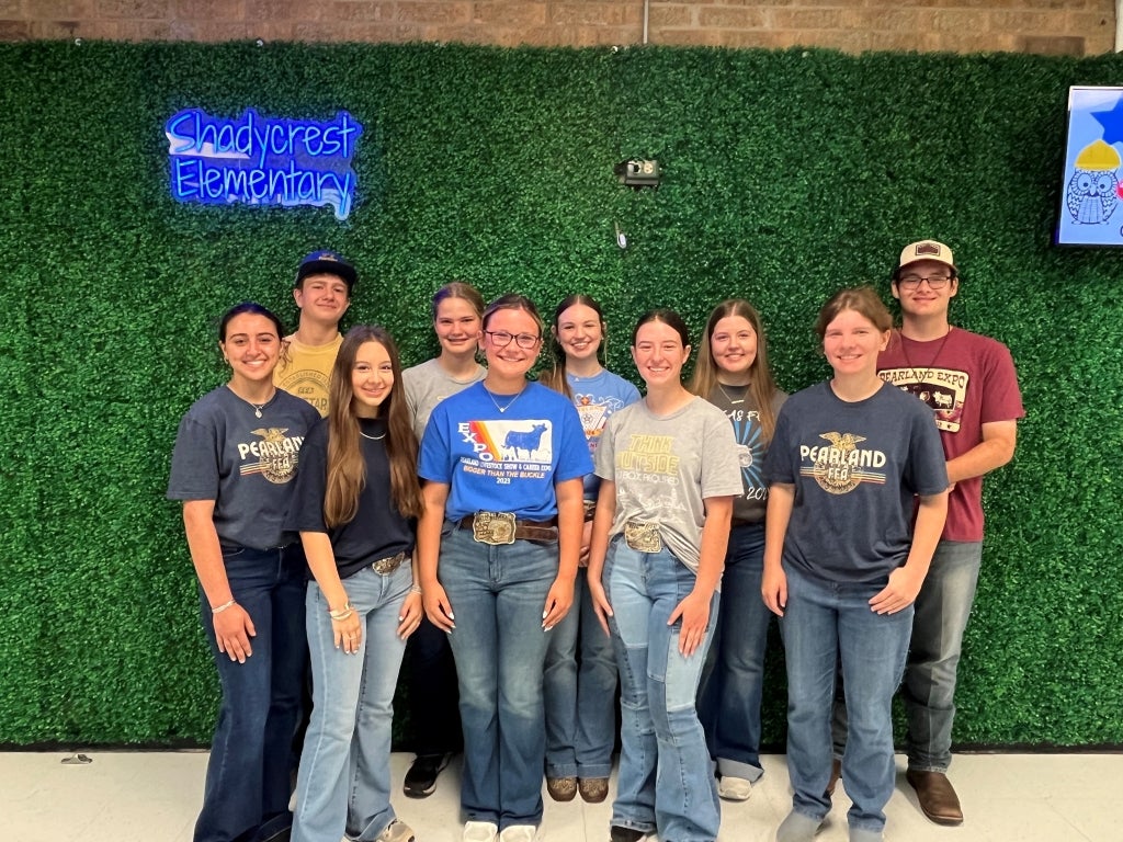 Pearland FFA members visit a local elementary school to help showcase agricultural education to younger students.