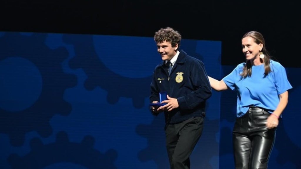 Rachel Kinsaul (right) celebrates with one of her chapter members, Mason Nunn (left), as he receives top honors in the Grain Production Placement proficiency award area. Photo courtesy of Rachel Kinsaul.