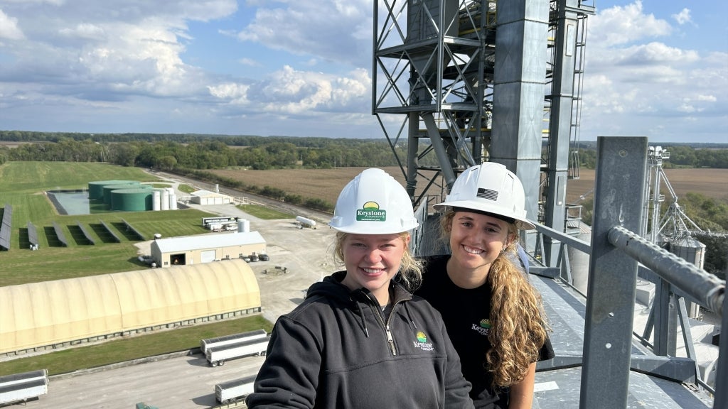 SEED participants Ava Coddington (left) and Eliza Uliczny (right) check out the view from the top of one of Keystone Cooperative’s grain branches. Photo courtesy of Keystone Cooperative.