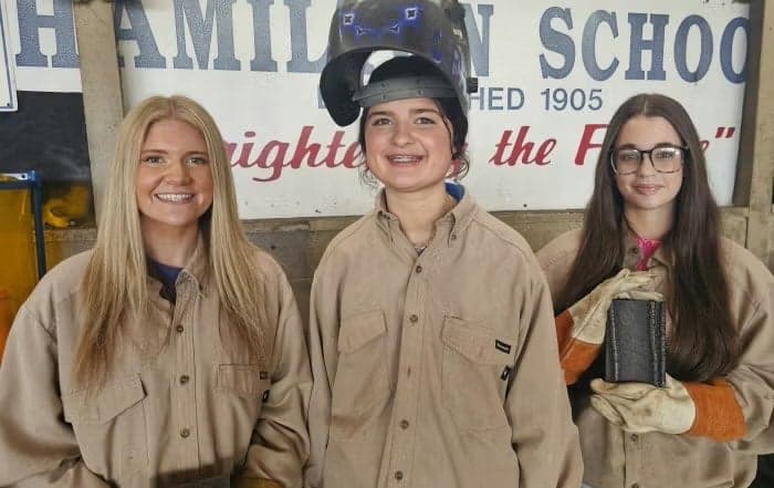 Kinsley Spearman (left), Macy Aycock (center) and Claudia Hughes (right) participate in welding as Hamilton FFA members. Photo courtesy of Kalem Hall.
