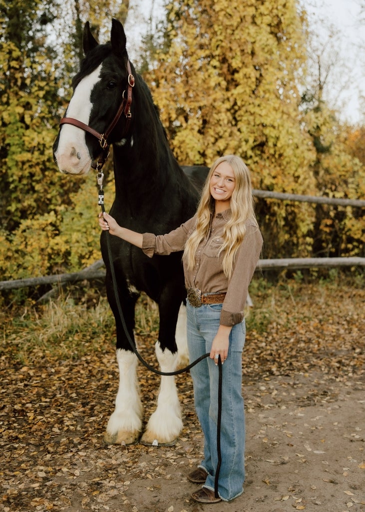 Barney continues to spend time around horses and stay involved with her family’s operations. Photo courtesy of Lucy Barney.