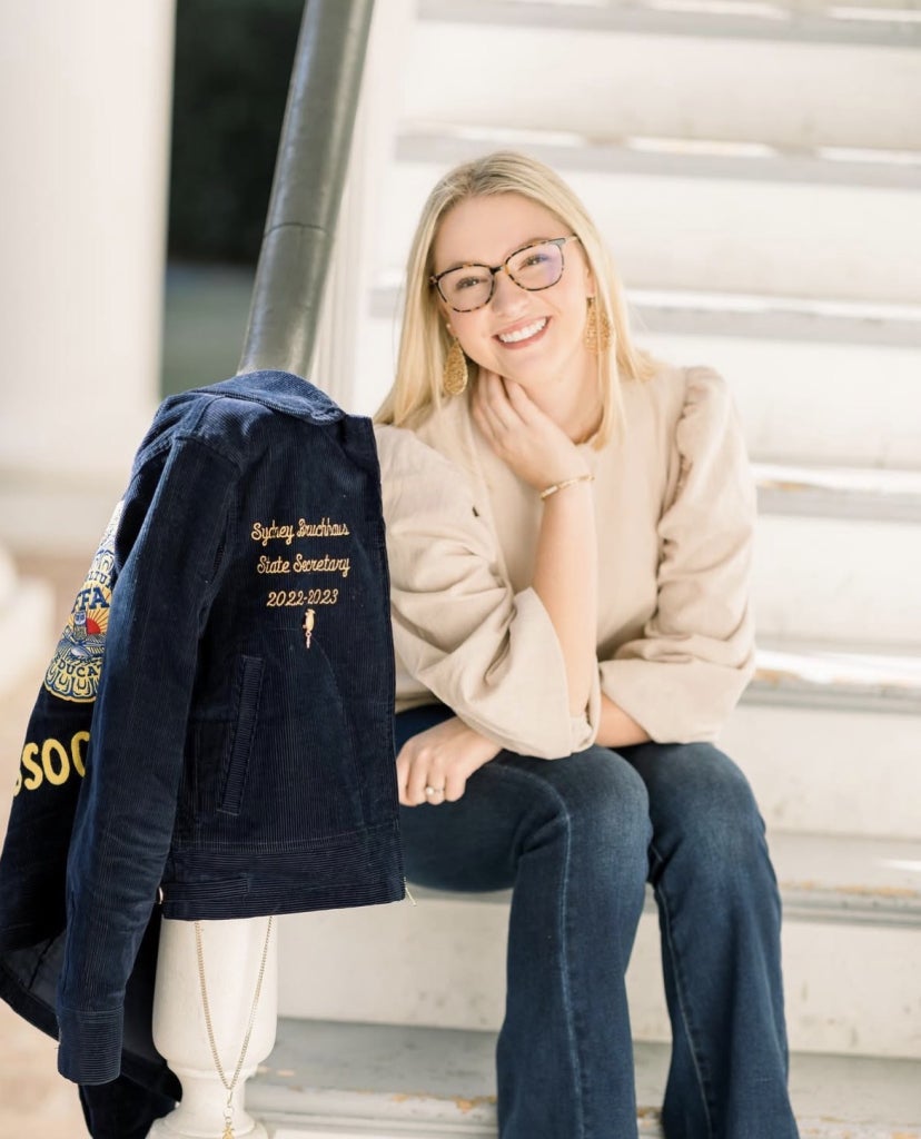 Sydney Bruchhaus continues to show that confidence, service and dedication can open doors to opportunities far beyond what she once imagined.