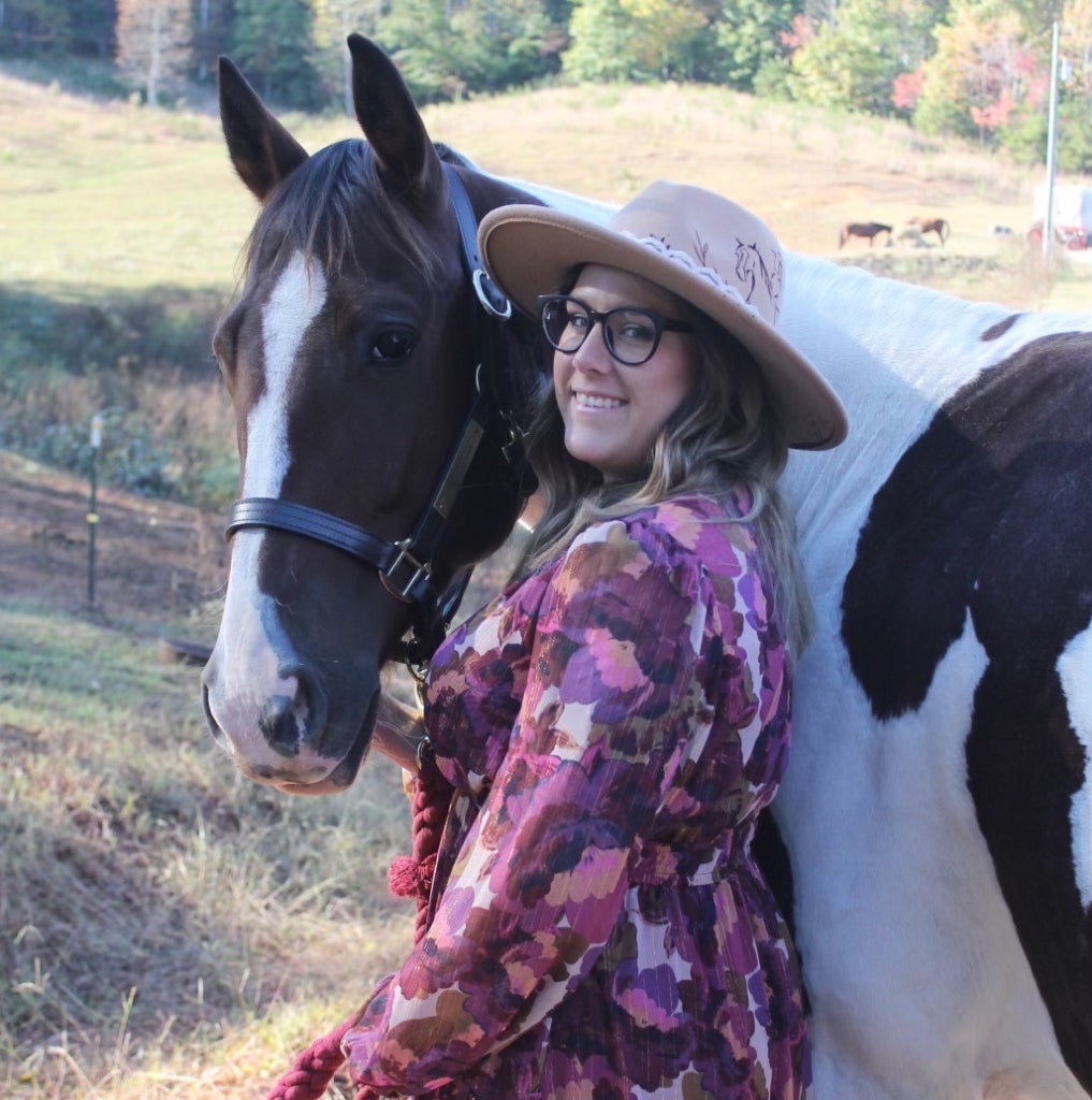 Theobald also cares for her own horses, like Graham.