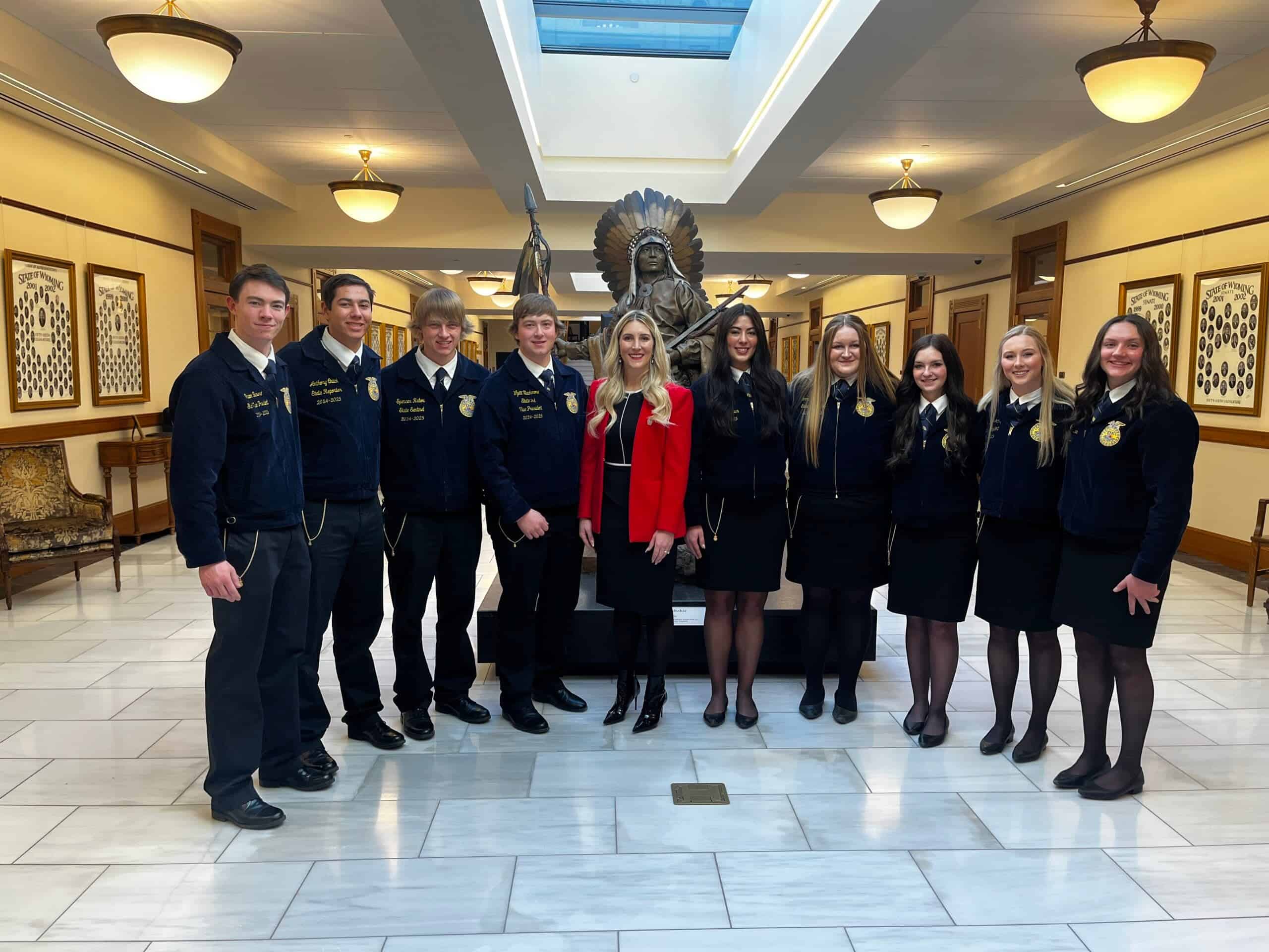 The 2024-25 Wyoming FFA State Officer Team with Superintendent Megan Degenfelder (center). Officers include, from left to right: Shawn Bassart, Anthony Quick, Spencer Rabou, Wyatt Blackmore, Riley Banker, Emmer Pehringer, Shelby Clark, Ahnya Ivie-Moody and Sage Wells.