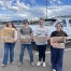 Members of the Cheyenne Frontier FFA Chapter’s Building Communities Committee pose outside of Laramie County Senior Services with care kit components.
