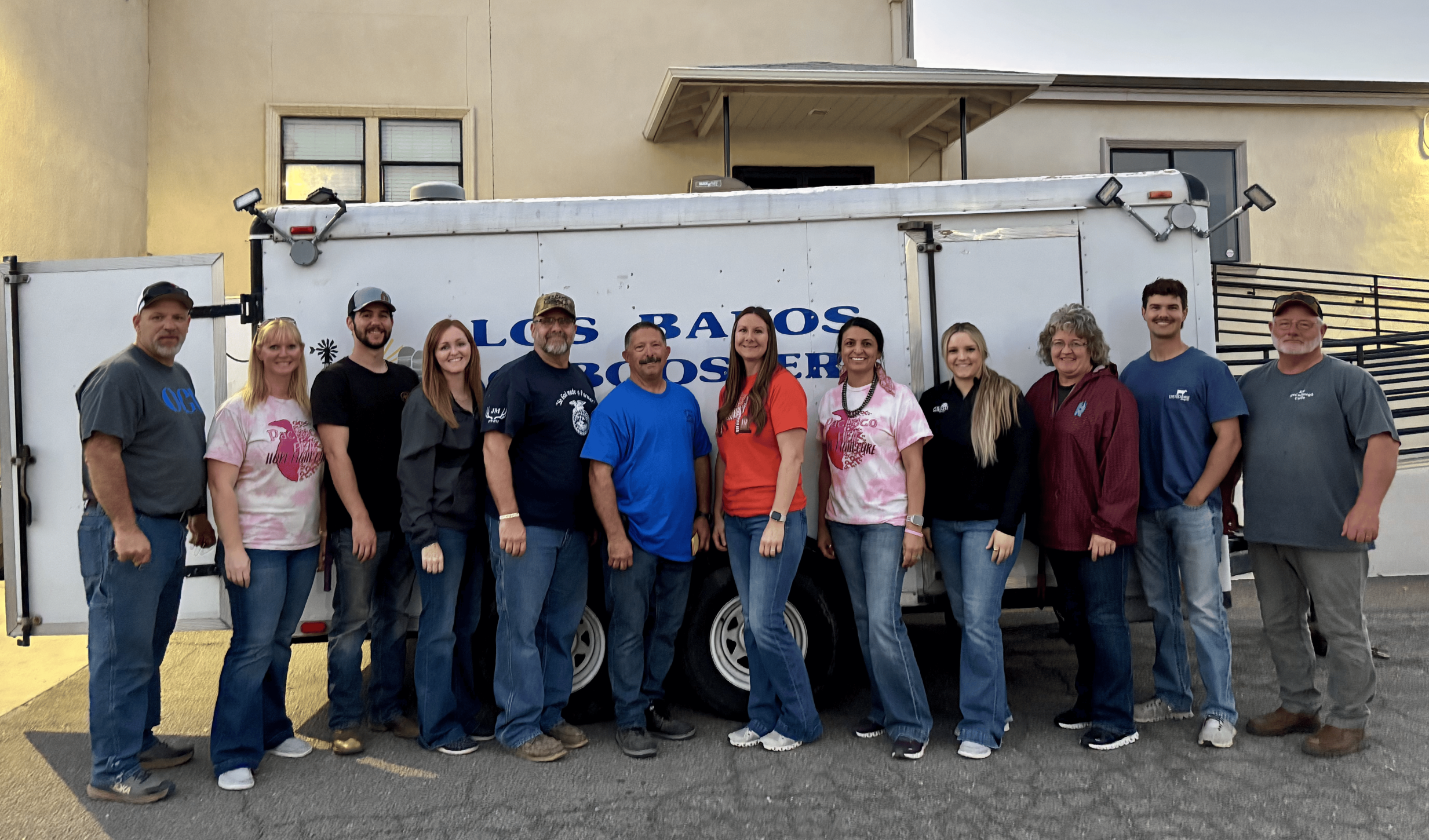 Los Banos Ag Booster President Don Baker joins the Pacheco and Los Banos FFA advisors for a group photo.