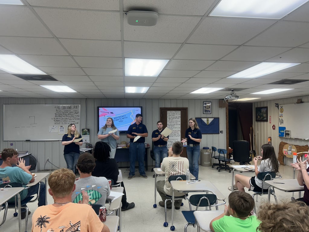 Greene County FFA Chapter officers present awards to the members.