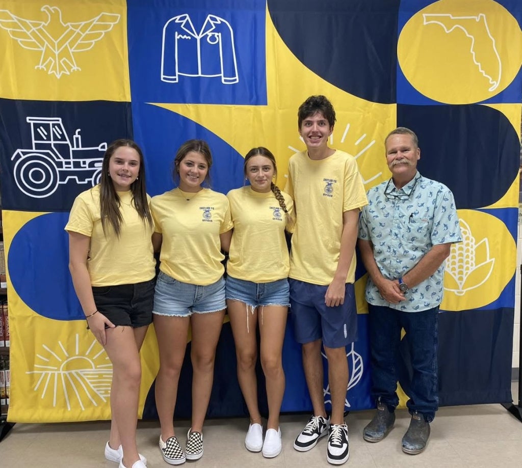 Chiefland Jr. FFA Chapter officers and their advisor, Mr. Stevenson, at the annual officer retreat.
