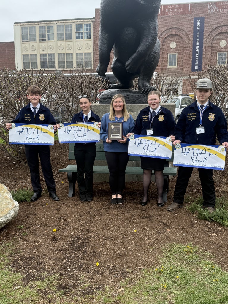 Nolan Davis, Lea Marchesseault, Brittany Hemond, Sierra Hemond and Lachlan Newell pose for a picture after winning high overall livestock evaluation team for the state of Maine.
