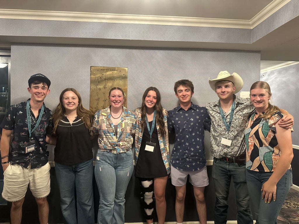 Members hear a call to action at the final session of the conference and seek to make positive change in the lives of others. (Left to Right: Benjamin Burnett, Kate Cooper, Landyn Markwardt, Paige Douglas, Trever Campbell, Jessie Frazee, and Raynie Norgard)