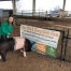Maggie Carroll at eight years old donating her pig to Pork for Packs.