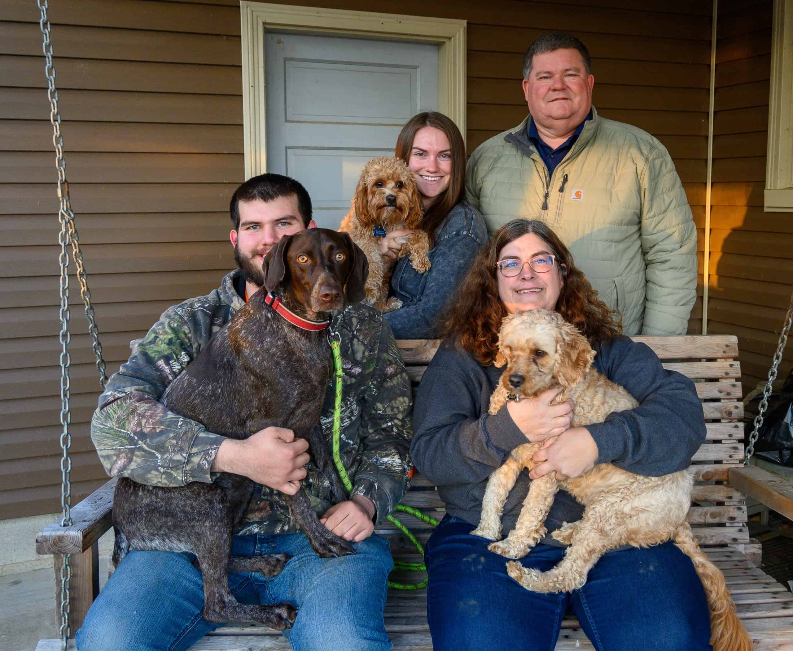 Greg Knott (back row, right) and his wife, Brooke (front row, right), daughter, Riley (back row, left), and son, Hayden (front row, left).