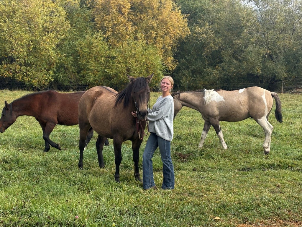 Hadley with her horses.