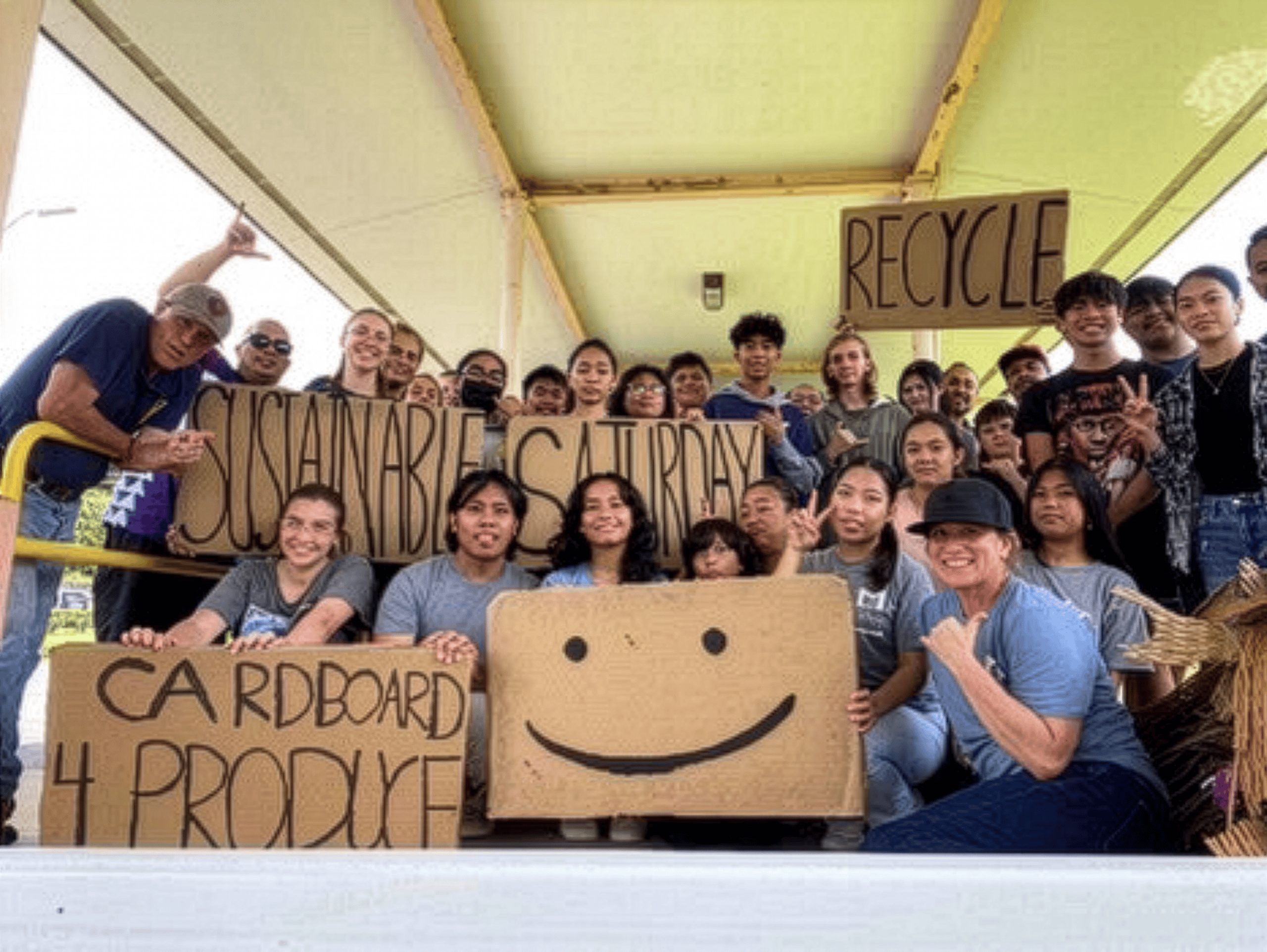 Keaʻau High FFA Sustainable Saturday group photo. (Jordan is positioned above the Y in Saturday)