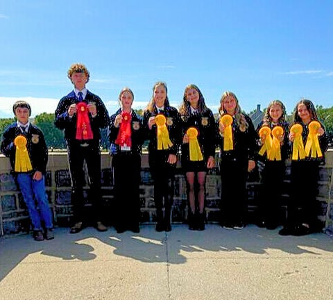 Culpeper Middle FFA members display their awards earned at the 98th annual Virginia FFA State Convention.