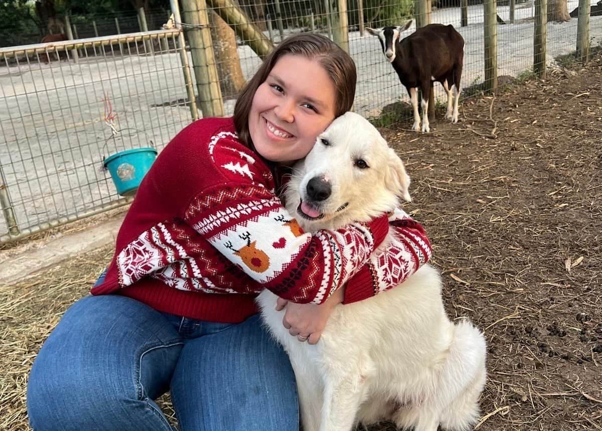 Morgan works at Aiyana’s Empire Dairy Goat farm with her favorite helper, Samar.