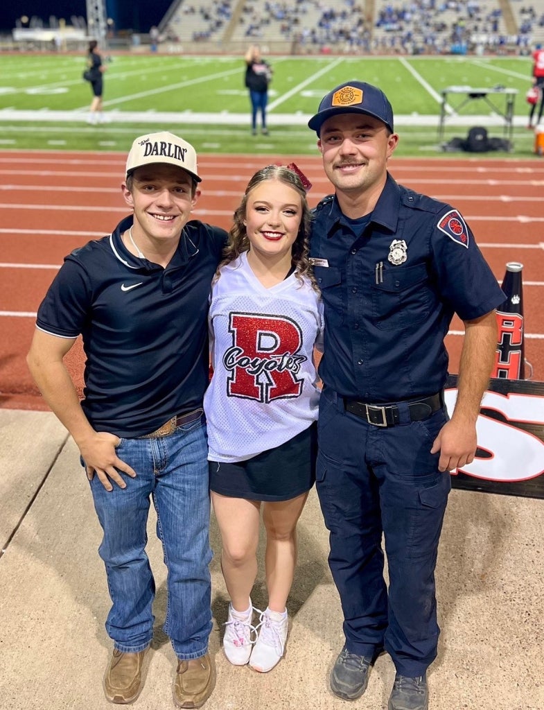 Lukas Montgomery (left), Carly Montgomery (middle) and Chester Montgomery (right) line up for a family photo.