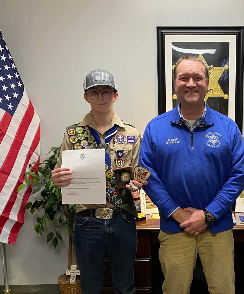 Travis Mendenhall (left) with Lauderdale County Sheriff Brian Kelley (right) after being awarded the rank of Eagle Scout.