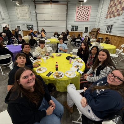 Scott and Simon Kenton FFA members eating their Thanksgiving meal.