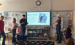 Member Kayden Brewer teaching elementary students about Beef.
