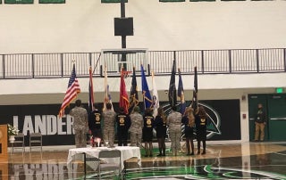 Lander FFA and United States Army members present the colors.