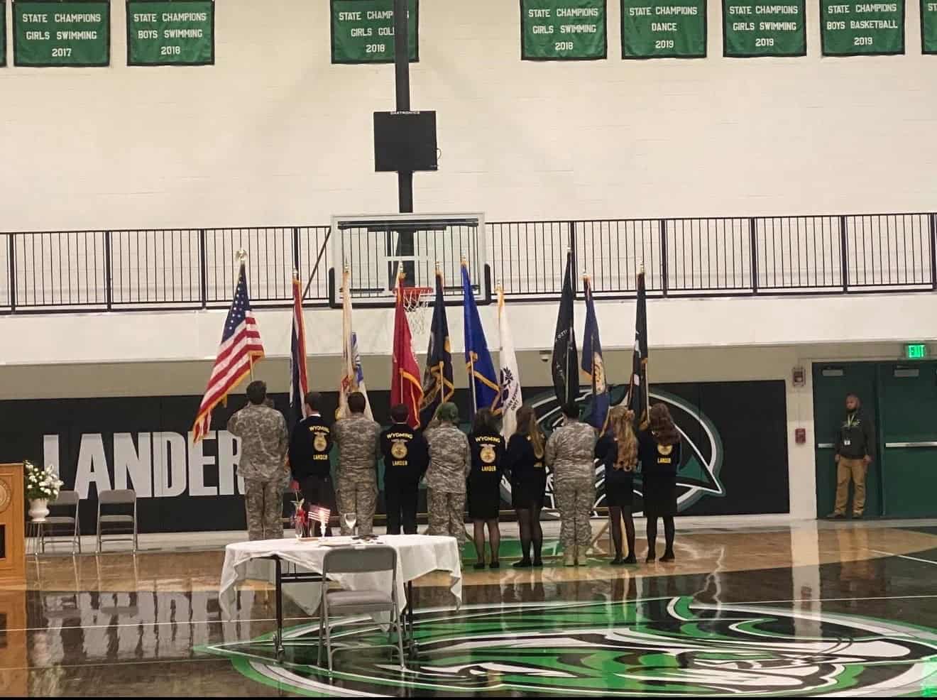 Lander FFA and United States Army members present the colors.
