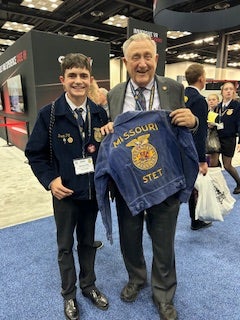 Brock Pitt from Stet, Mo., sees his hometown hero at the 2023 National FFA Convention & Expo.