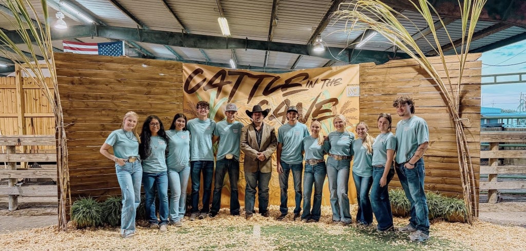 Pictured left to right: Advisor Kalei Hogan, Lailah Simon, Yazmine Carrera, Jaxson Palladino, Jaxon Hernandez, Judge Wade Kirkwood, Wyatt Keen, Camryn Prowant, Riley Sutton, Chloe Branaman, Bristol Rives, and Landon Sutton.