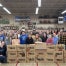 Sapulpa FFA gathered around completed Thanksgiving boxes.
