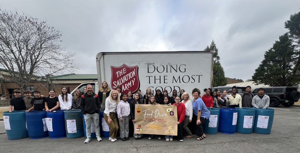 The Rome Middle School CTSO's department in front of The Salvation Army truck, ready to make the donations.