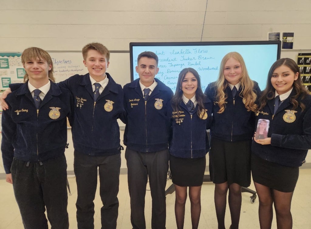 Dominic Araujo-Woodward (third from the left) with his officer team.
