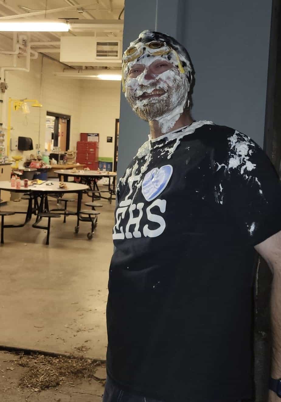 Cheyenne Frontier FFA advisor Joe Allen wears the aftermath of the Stuff the Pantry Pie Challenge.